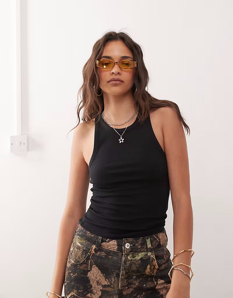 Топ COLLUSION в рубчик черного цвета
Топ COLLUSION в рубчик черного цвета