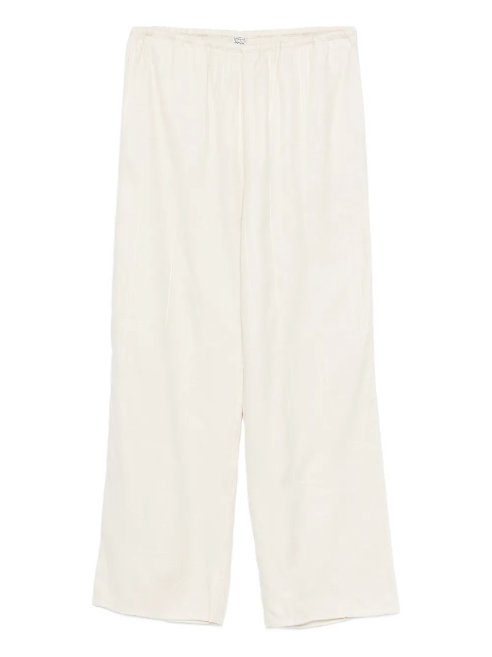 Брюки с монограммным узором Toteme, нейтральный
Брюки с монограммным узором Toteme, нейтральный