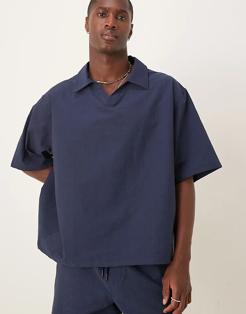 Свободная фактурная рубашка-поло ASOS DESIGN темно-синего цвета — часть комплекта 
Свободная фактурная рубашка-поло ASOS DESIGN темно-синего цвета — часть комплекта