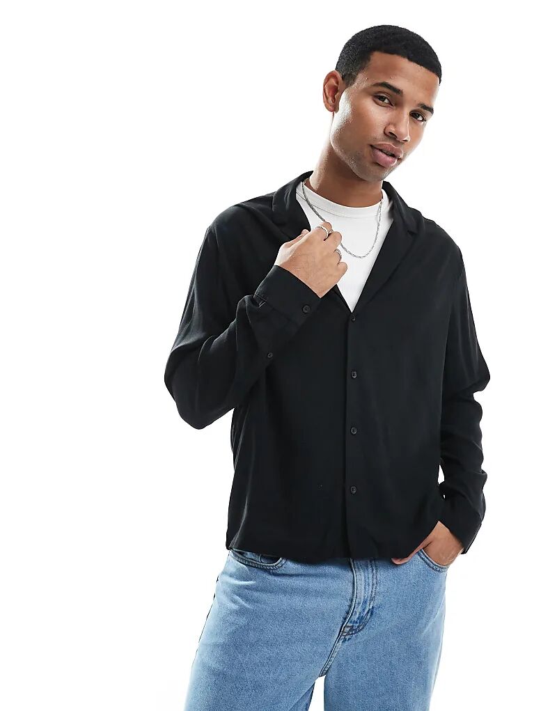 Рубашка свободного кроя ASOS DESIGN с низким воротником черного цвета
Рубашка свободного кроя ASOS DESIGN с низким воротником черного цвета