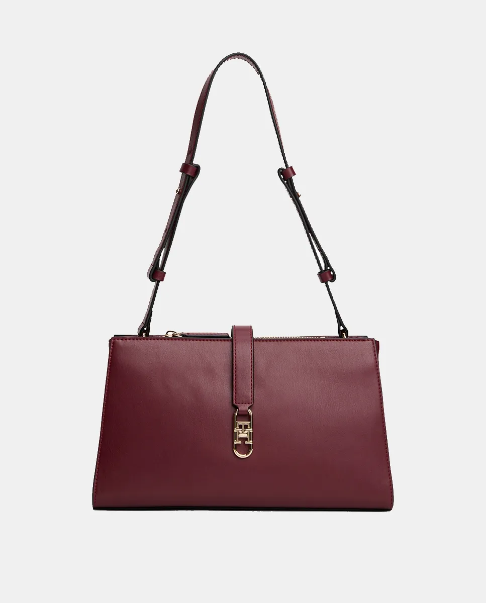 Женская сумка через плечо бордового цвета Tommy Hilfiger
Женская сумка через плечо бордового цвета Tommy Hilfiger