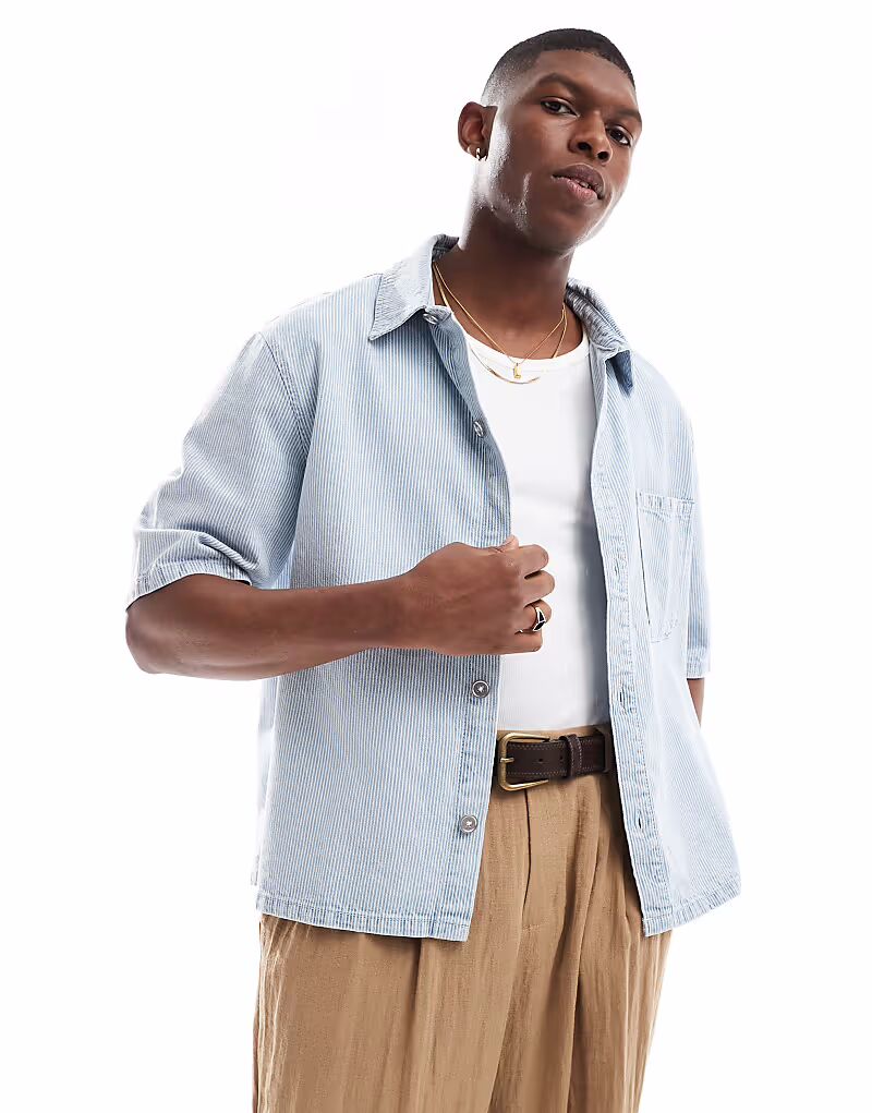 Полосатая джинсовая рубашка Bershka синего цвета 
Полосатая джинсовая рубашка Bershka синего цвета