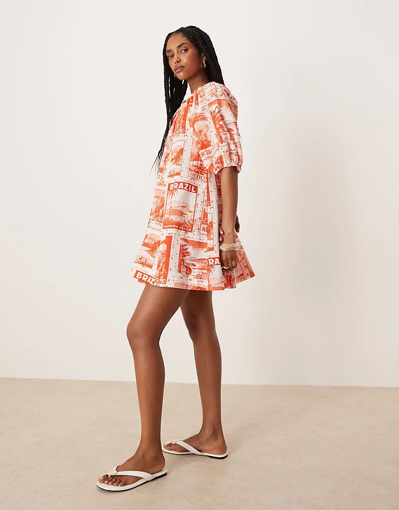 Мини-платье из хлопкового поплина ASOS DESIGN с рукавами-фонариками и красным принтом открытки 
Мини-платье из хлопкового поплина ASOS DESIGN с рукавами-фонариками и красным принтом открытки