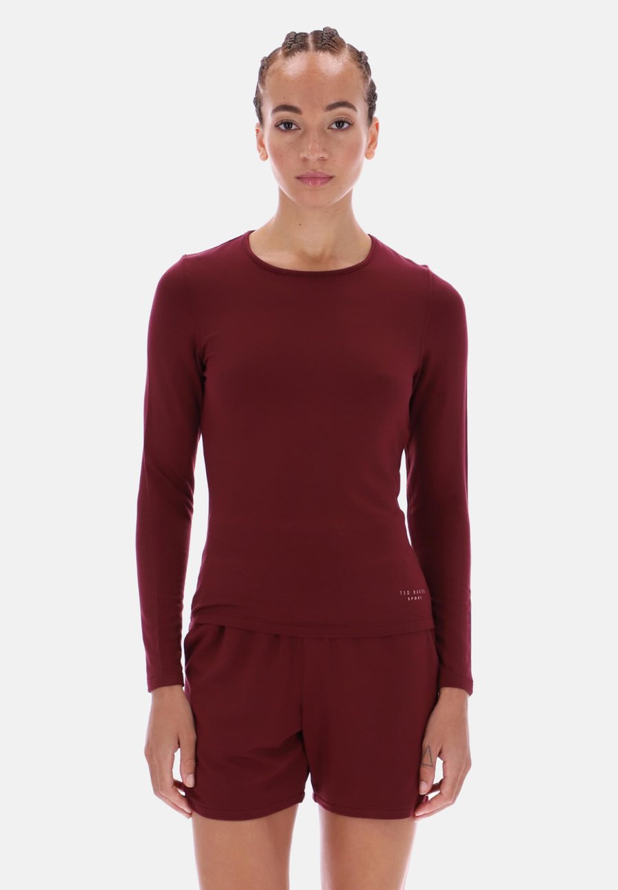 Топ Ted Baker Sports Long sleeved top, Tawny Port/Bordeaux
Топ Ted Baker Sports Long sleeved top, Tawny Port/Bordeaux