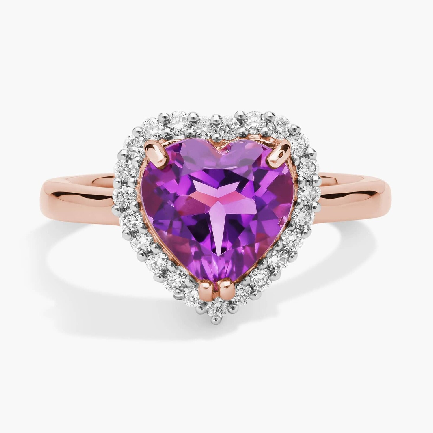 Кольцо Halo с аметистом в форме сердца и бриллиантами из 14-каратного розового золота Blue Nile 
Кольцо Halo с аметистом в форме сердца и бриллиантами из 14-каратного розового золота Blue Nile