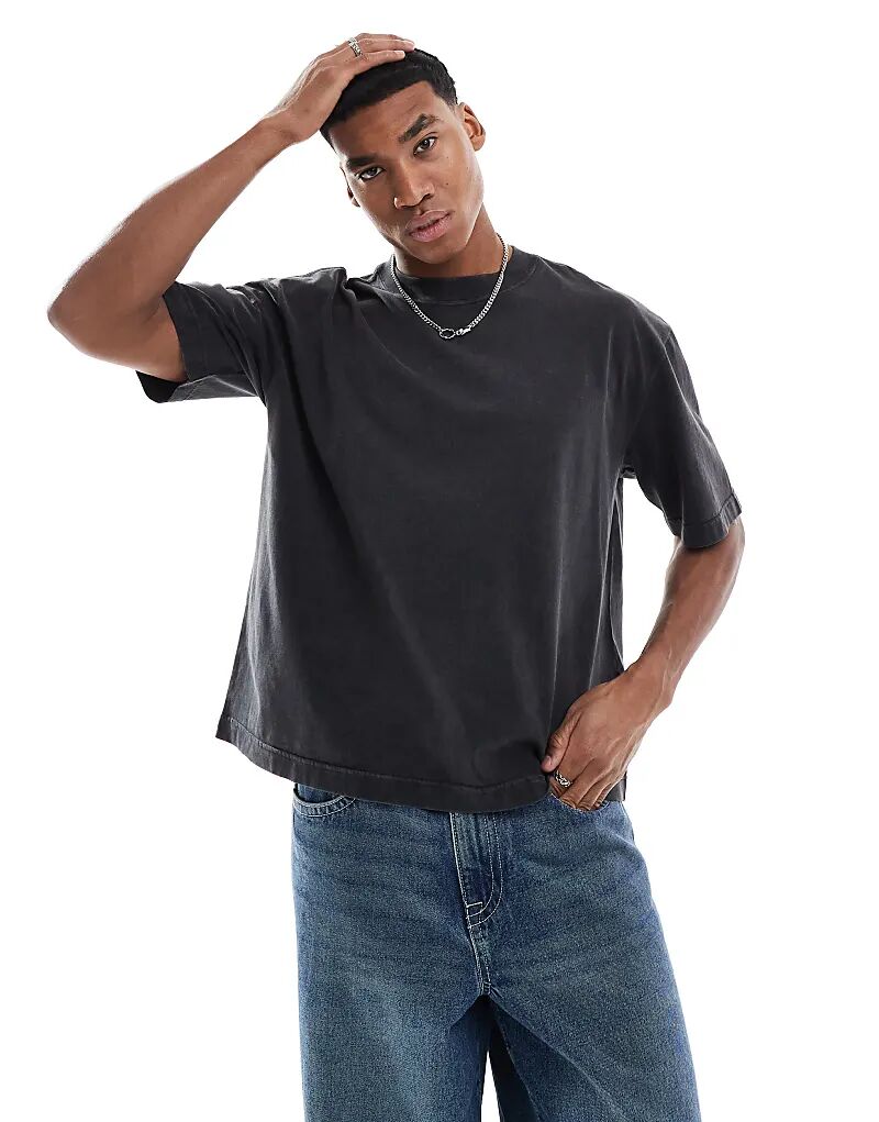 Укороченная свободная футболка Hollister со швами кислотно-черного цвета
Укороченная свободная футболка Hollister со швами кислотно-черного цвета