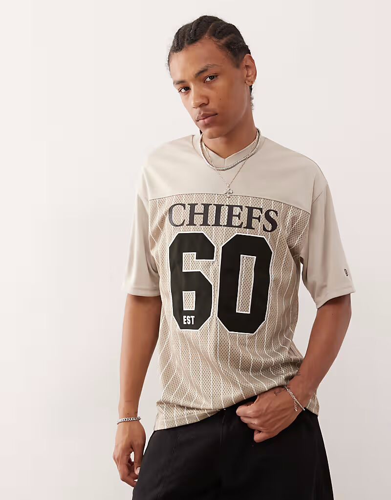 Спортивный топ New Era Kansas City Chiefs в полоску кремового цвета
Спортивный топ New Era Kansas City Chiefs в полоску кремового цвета