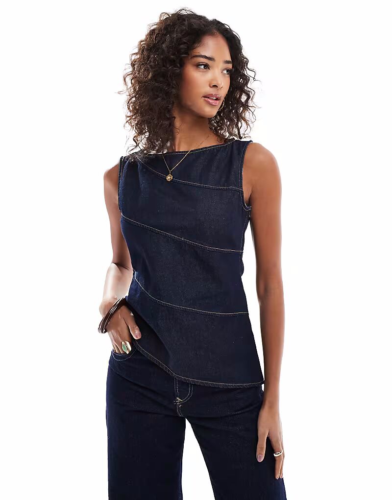 Асимметричный джинсовый топ ASOS DESIGN с открытыми швами цвета индиго
Асимметричный джинсовый топ ASOS DESIGN с открытыми швами цвета индиго