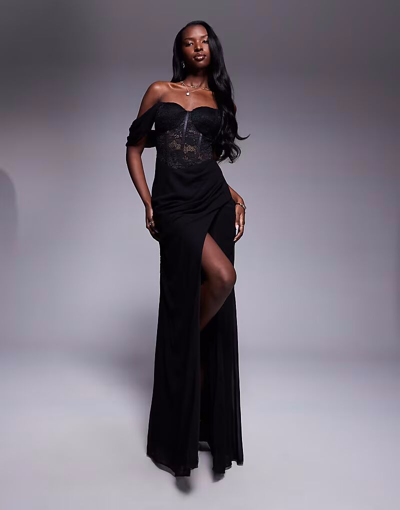 Платье макси Goddiva из фестончатого кружева и шифона с крылышками и корсетом черного цвета 
Платье макси Goddiva из фестончатого кружева и шифона с крылышками и корсетом черного цвета