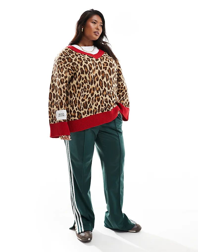 Эксклюзивный удлиненный джемпер с V-образным вырезом и контрастной окантовкой в леопардовом стиле от Holly Wynne Renee Studio
Эксклюзивный удлиненный джемпер с V-образным вырезом и контрастной окантовкой в леопардовом стиле от Holly Wynne Renee Studio