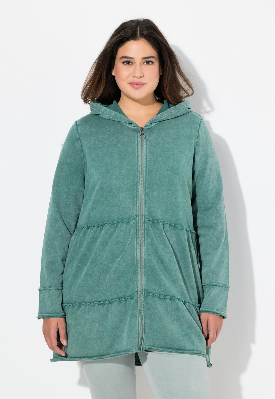 Толстовка Ulla Popken TIERED FLOUNCE PANEL HOODIE, Green
Толстовка Ulla Popken TIERED FLOUNCE PANEL HOODIE, Green