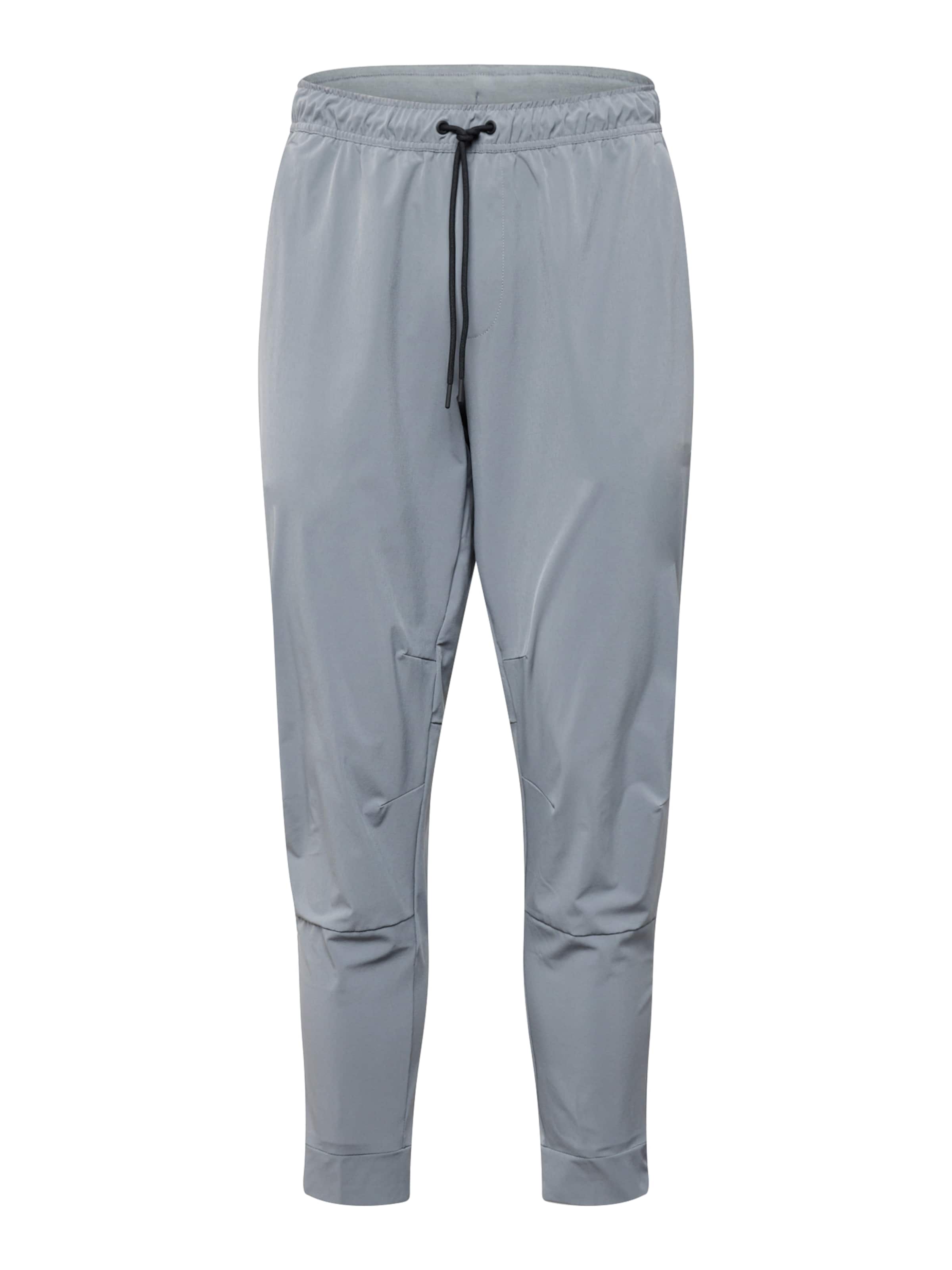 NIKE Узкие спортивные штаны 'UNLIMITED' в сером цвете
NIKE Узкие спортивные штаны 'UNLIMITED' в сером цвете