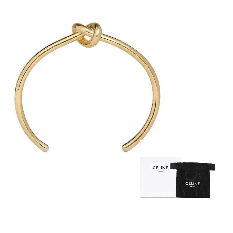 Ультратонкий браслет с узлом из латуни с золотым покрытием CELINE
Ультратонкий браслет с узлом из латуни с золотым покрытием CELINE