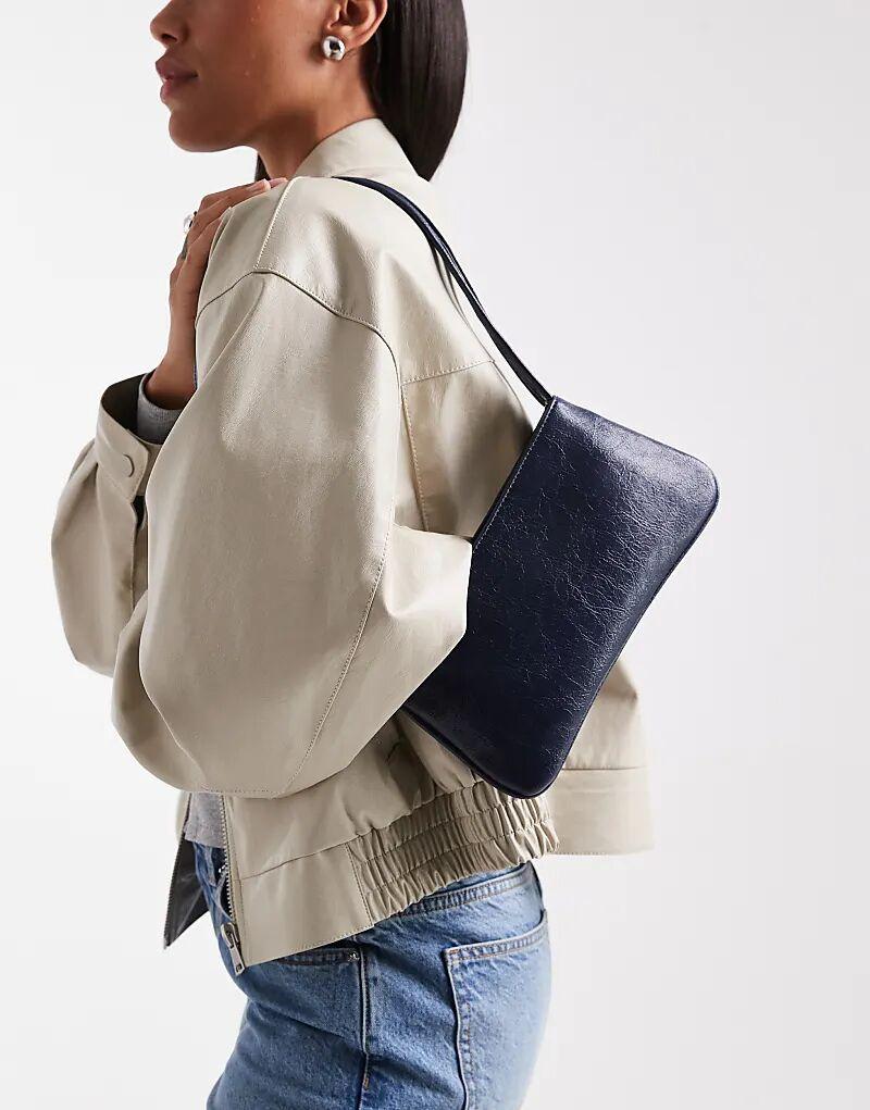 Сумка через плечо ASOS DESIGN с двумя узкими ремешками и застежкой-молнией темно-синего цвета
Сумка через плечо ASOS DESIGN с двумя узкими ремешками и застежкой-молнией темно-синего цвета