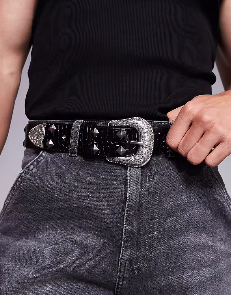 Ремень в стиле вестерн с заклепками и кристаллами ASOS DESIGN из черной искусственной кожи крокодила
Ремень в стиле вестерн с заклепками и кристаллами ASOS DESIGN из черной искусственной кожи крокодила