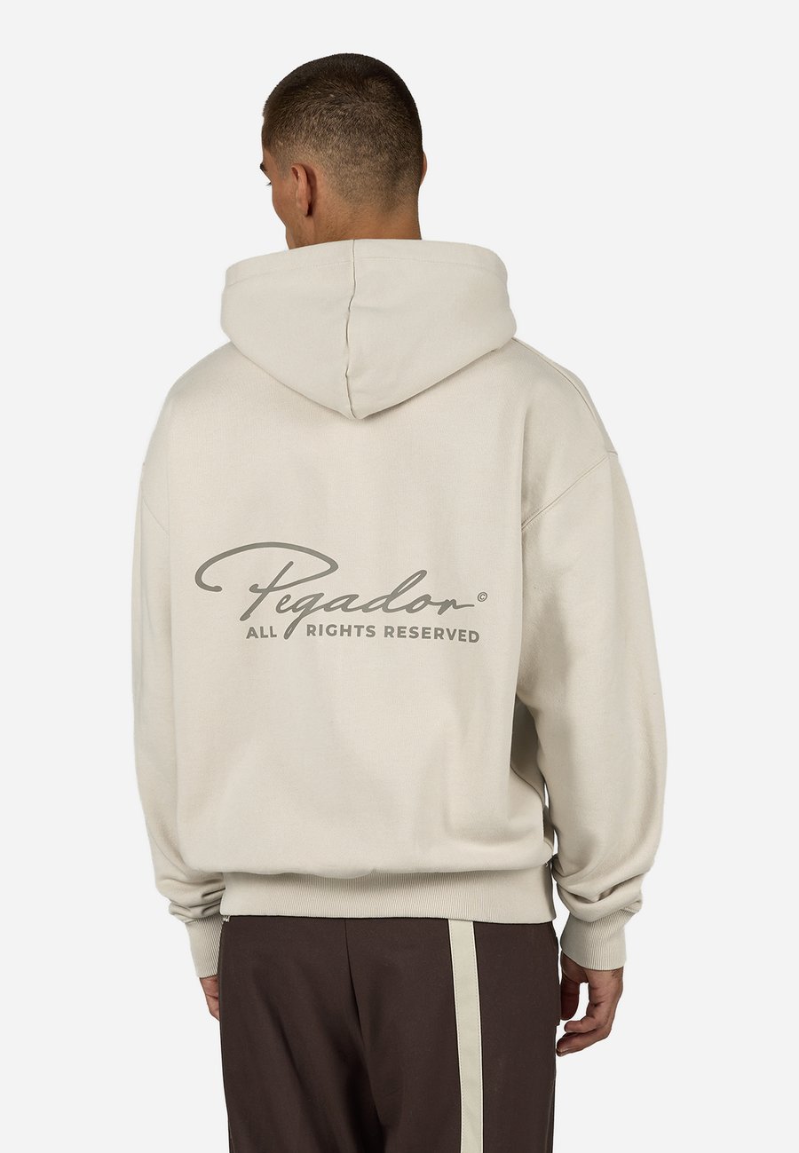 Толстовка Pegador PIKE JACKET, Washed Cozy Beige/Flint Grey/Grey
Толстовка Pegador PIKE JACKET, Washed Cozy Beige/Flint Grey/Grey