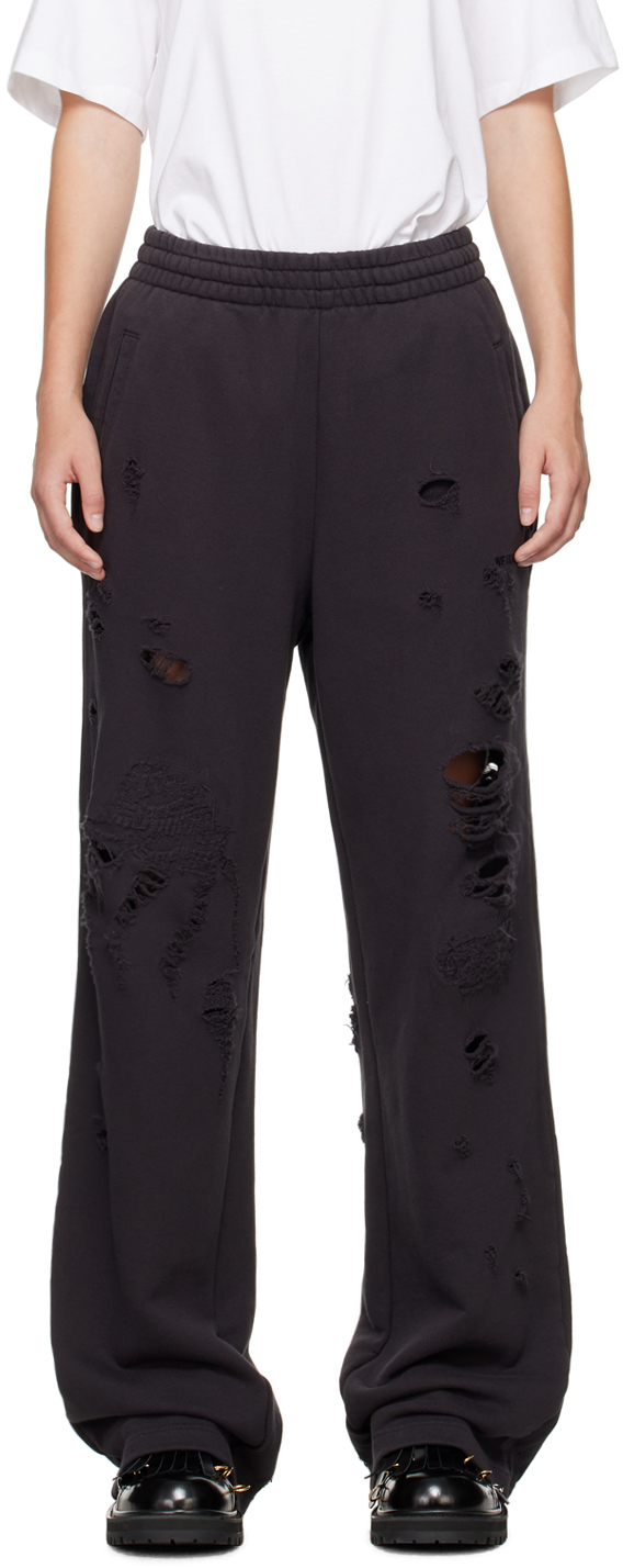 Потертые спортивные штаны We11done
Потертые спортивные штаны We11done