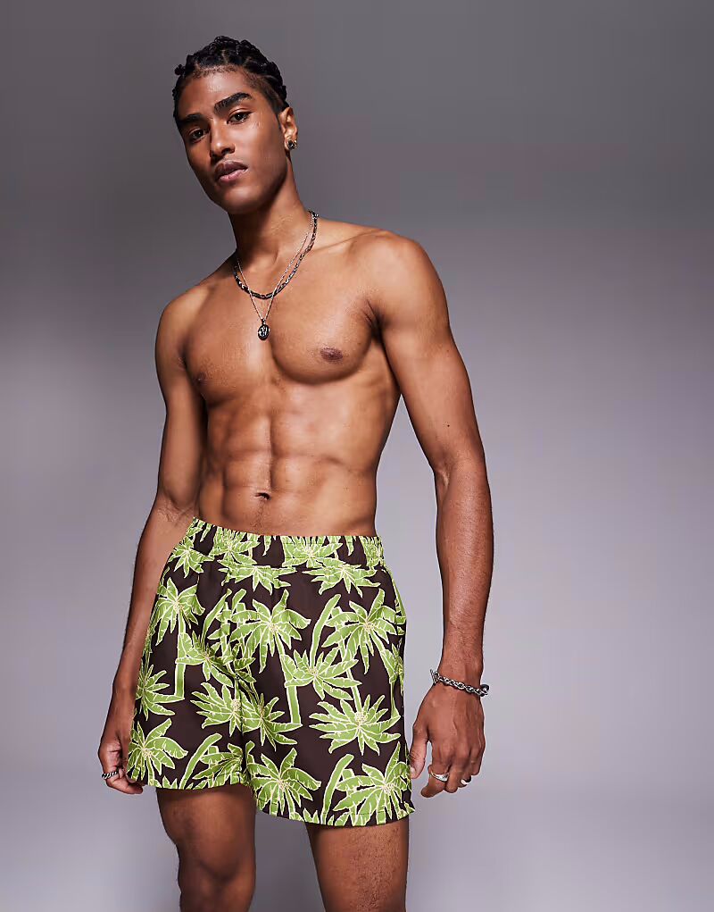 Короткие шорты для плавания ASOS DESIGN с черным принтом пальм
Короткие шорты для плавания ASOS DESIGN с черным принтом пальм