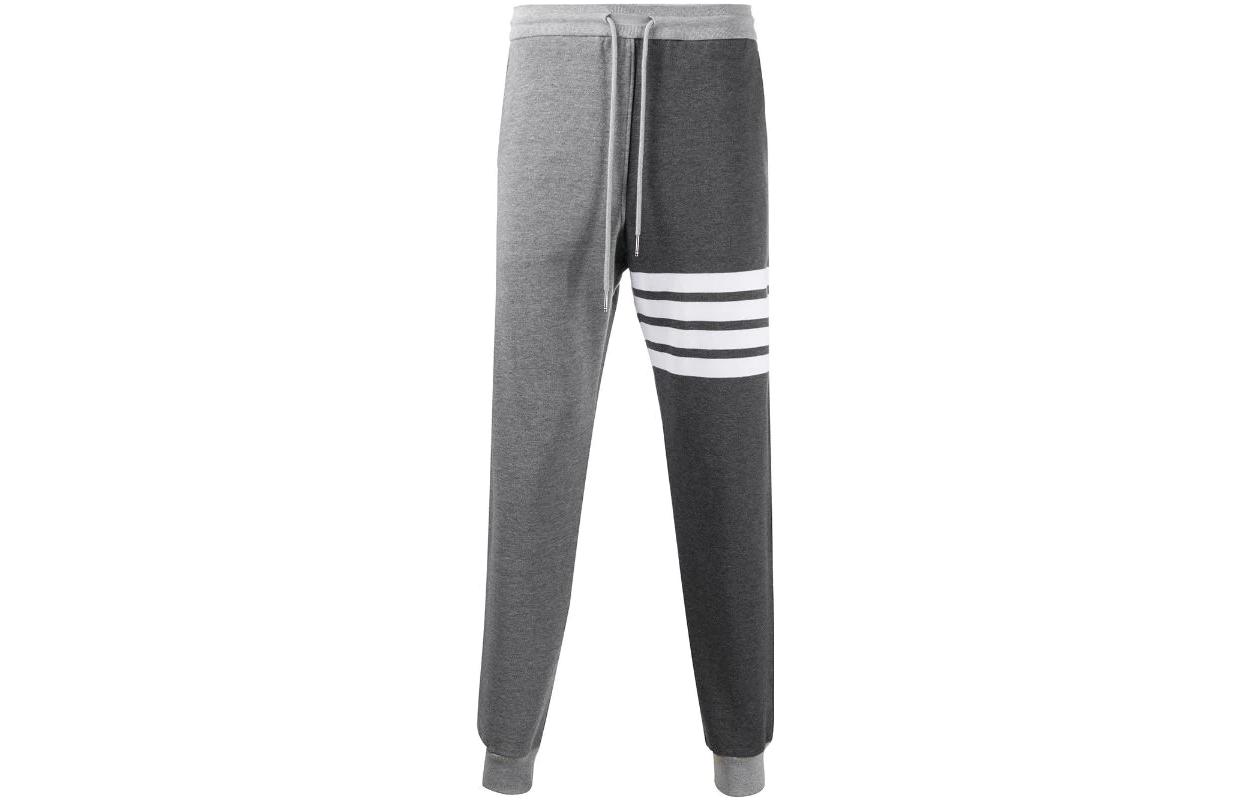 Тренировочные штаны с 4 полосками THOM BROWNE, серый
Тренировочные штаны с 4 полосками THOM BROWNE, серый