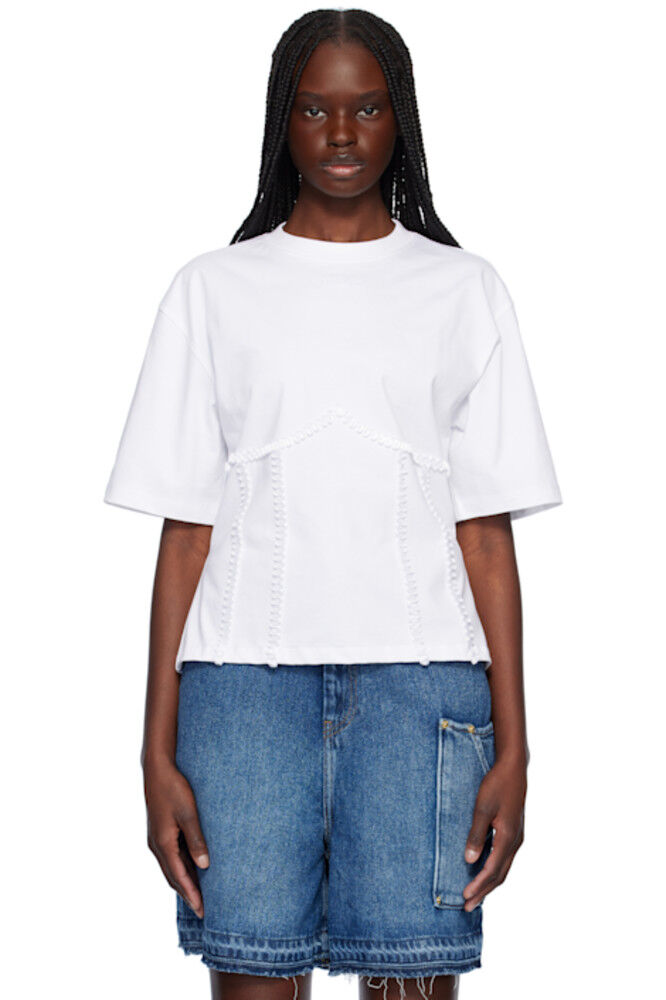 Белая хлопковая футболка с завязками на спине GANNI
Белая хлопковая футболка с завязками на спине GANNI