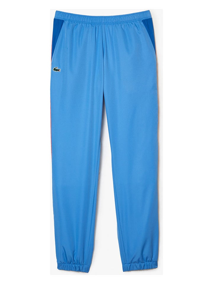 Светло-голубые спортивные штаны Lacoste
Светло-голубые спортивные штаны Lacoste
