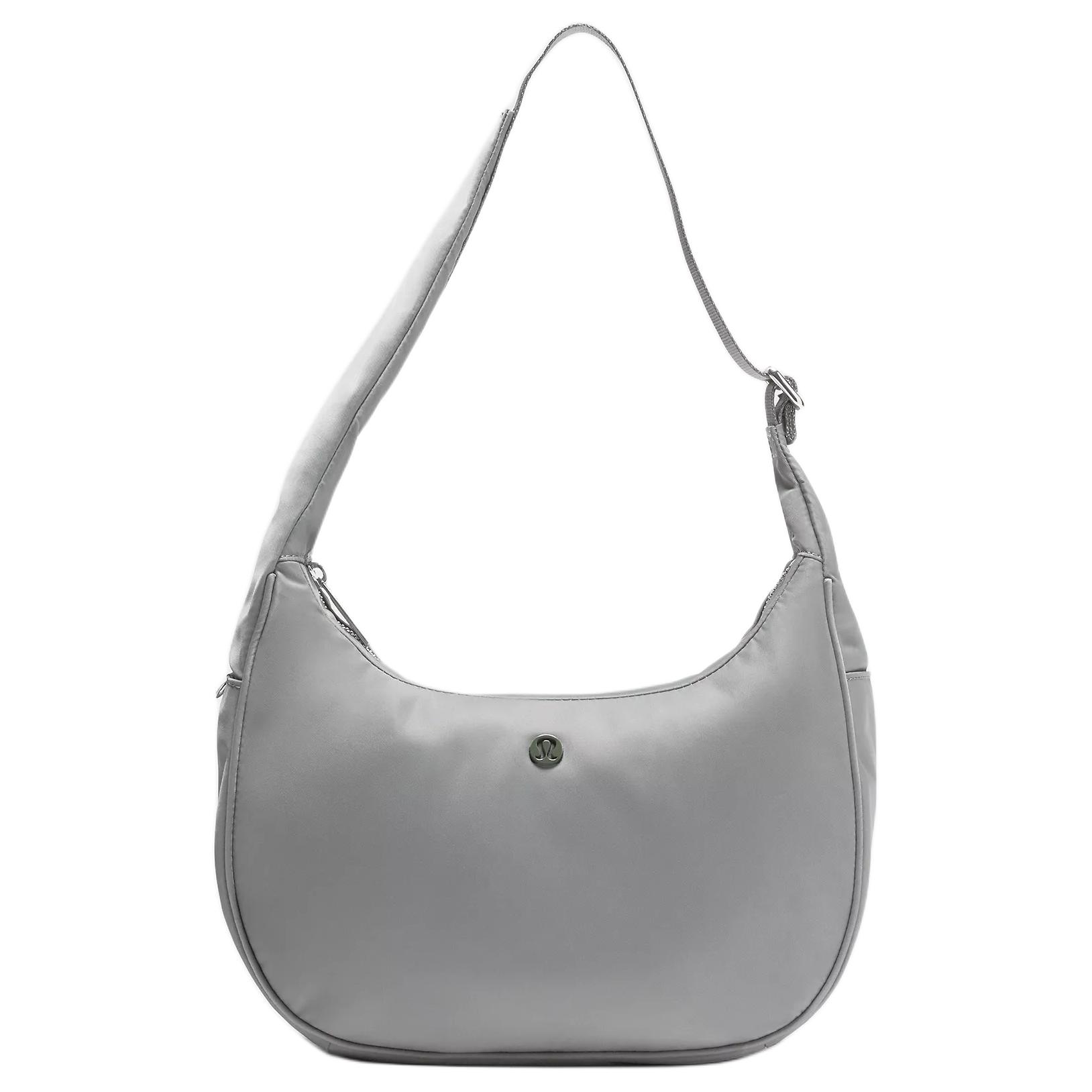 Lululemon Женская серая сумка через плечо из переработанного нейлона, Gray 
Lululemon Женская серая сумка через плечо из переработанного нейлона, Gray