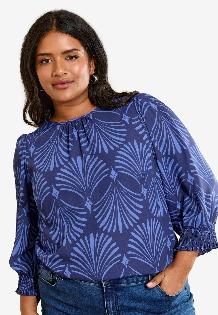 Блуза Friends Like These PLUS SIZE FIT 3/4 SLEEVE SHIRRED CUFF, Blue Fan Print/Blue
Блуза Friends Like These PLUS SIZE FIT 3/4 SLEEVE SHIRRED CUFF, Blue Fan Print/Blue