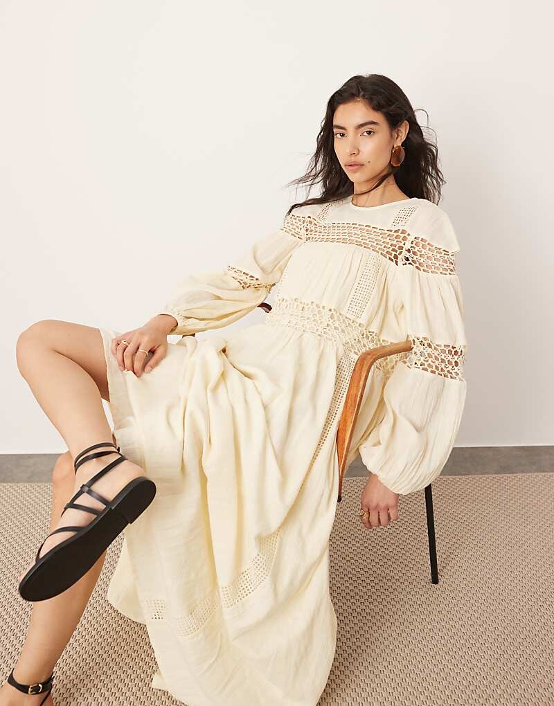 ASOS Edition 2013 Простое платье макси А-силуэта с объемными рукавами, заниженной талией, узкими манжетами и связанной крючком вставкой
ASOS Edition 2013 Простое платье макси А-силуэта с объемными рукавами, заниженной талией, узкими манжетами и связанной крючком вставкой
