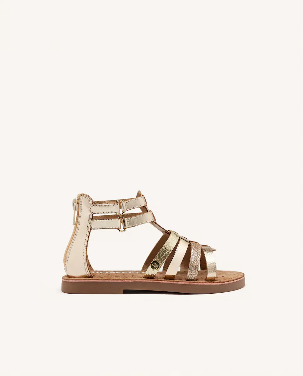 Босоножки из металлизированной кожи для девочек из золотой кожи с регулируемой застежкой Gioseppo
Босоножки из металлизированной кожи для девочек из золотой кожи с регулируемой застежкой Gioseppo