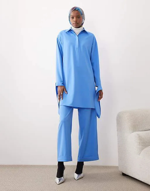 Синие узкие брюки-комбинезоны iyal
Синие узкие брюки-комбинезоны iyal