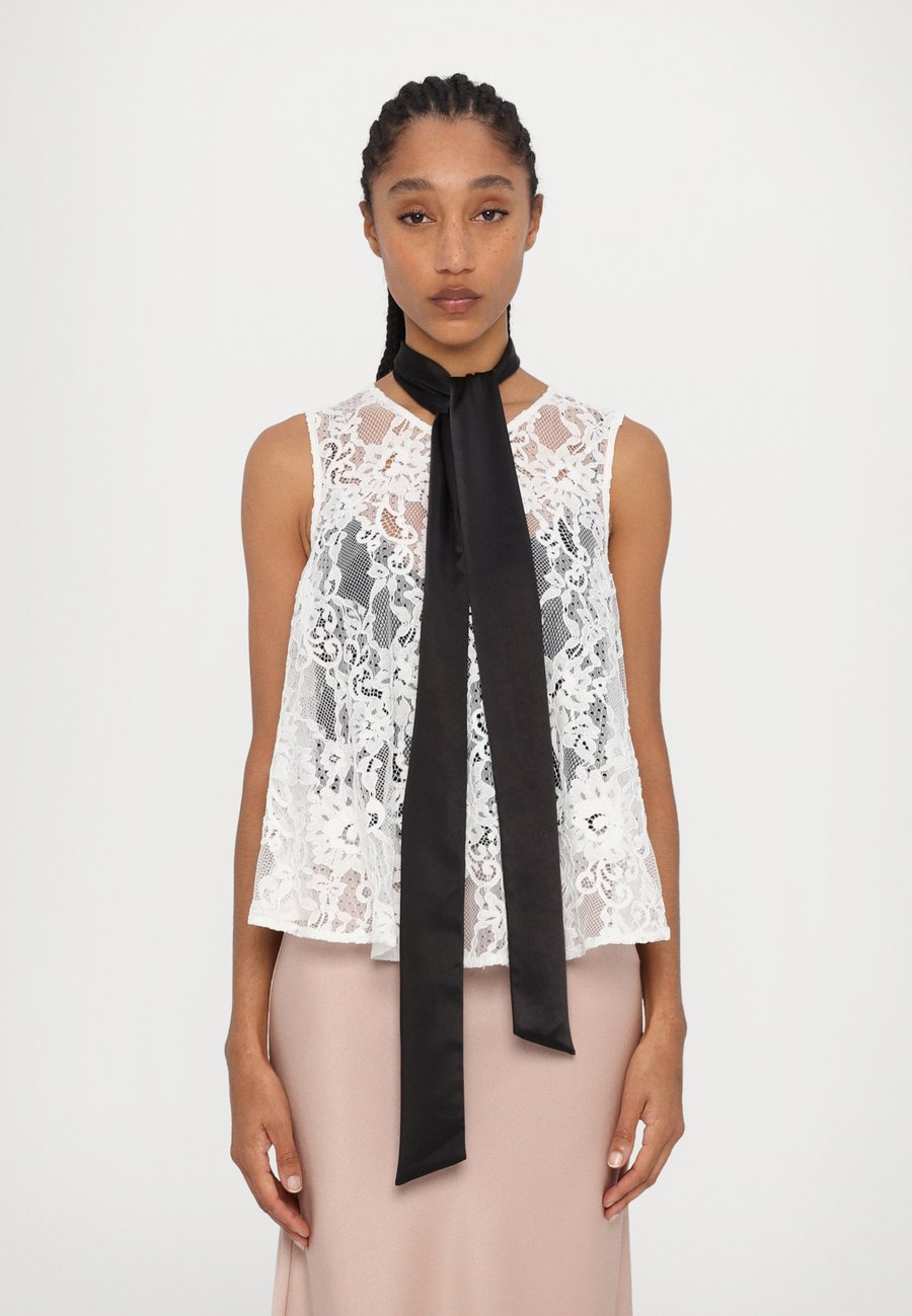 Блуза Ida Sjöstedt AMELIE, Ivory/Off-White
Блуза Ida Sjöstedt AMELIE, Ivory/Off-White