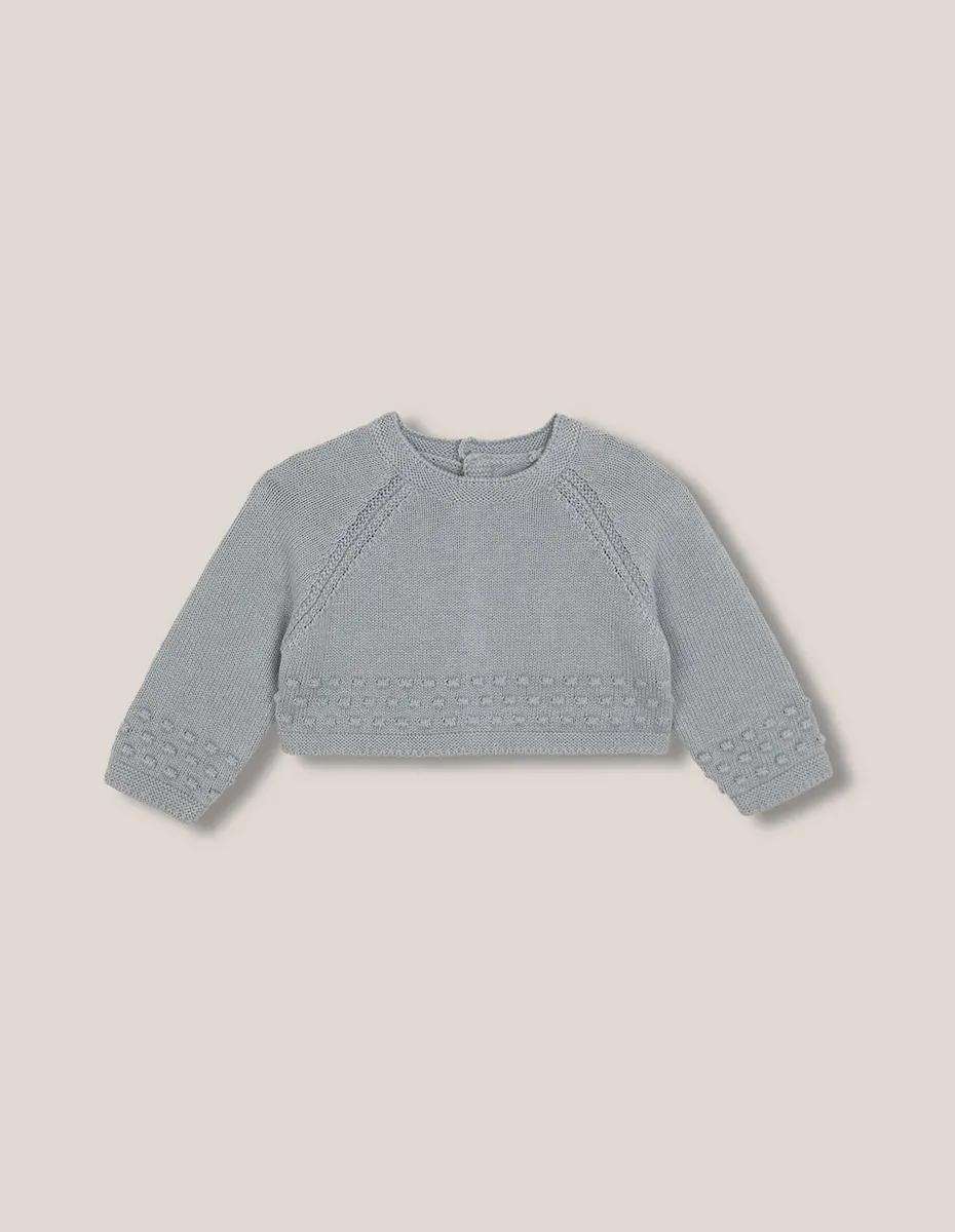 Детский свитер с шерстью, с деталями простой вязки и зелеными помпонами Gocco
Детский свитер с шерстью, с деталями простой вязки и зелеными помпонами Gocco