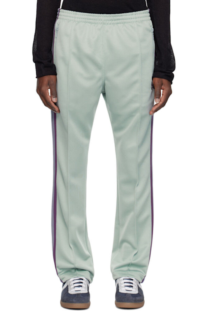 Узкие зеленые спортивные штаны NEEDLES
Узкие зеленые спортивные штаны NEEDLES