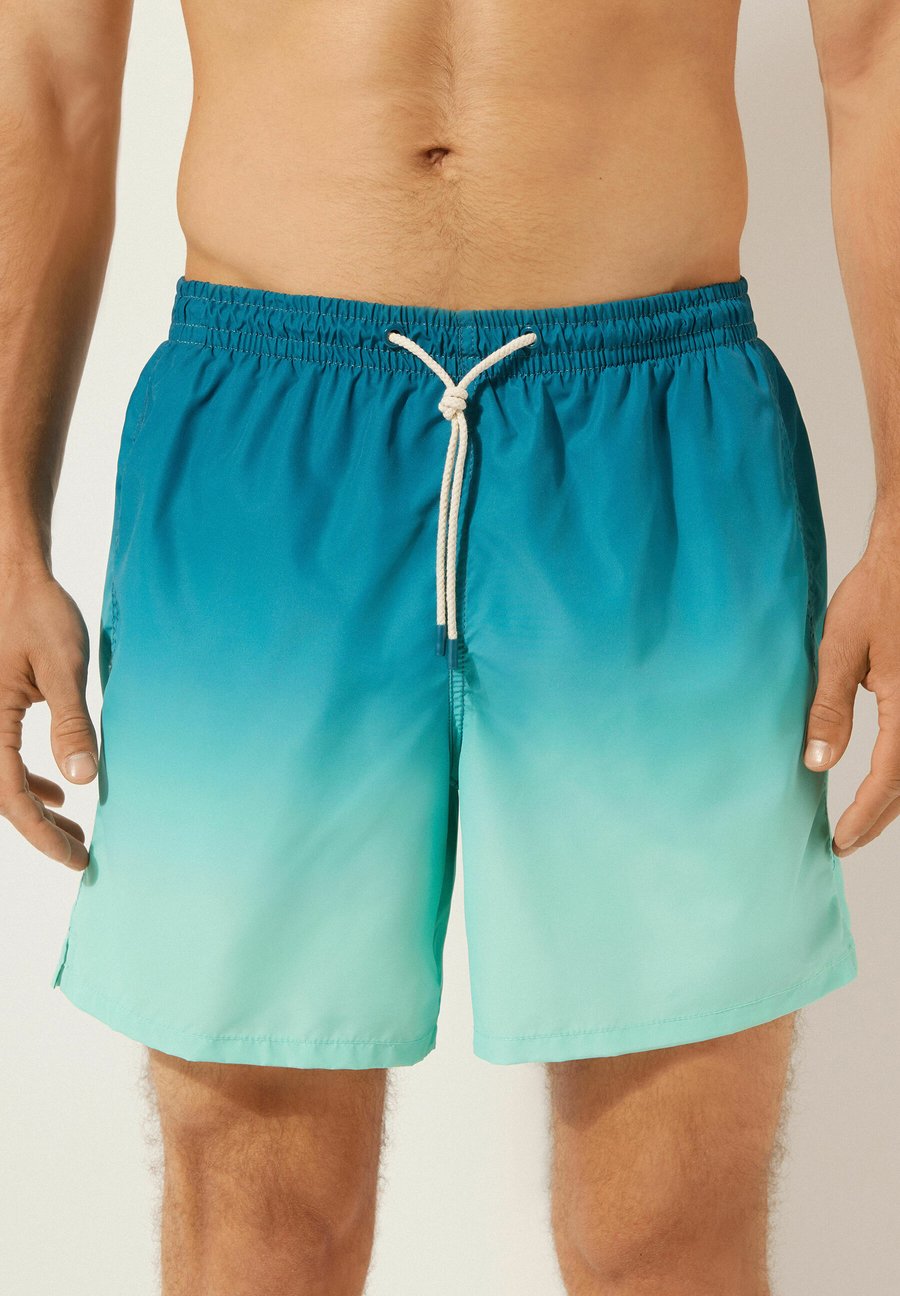 Шорты для плавания Calzedonia Swimming shorts, E Shades Of Ocean Blue/Turquoise
Шорты для плавания Calzedonia Swimming shorts, E Shades Of Ocean Blue/Turquoise
