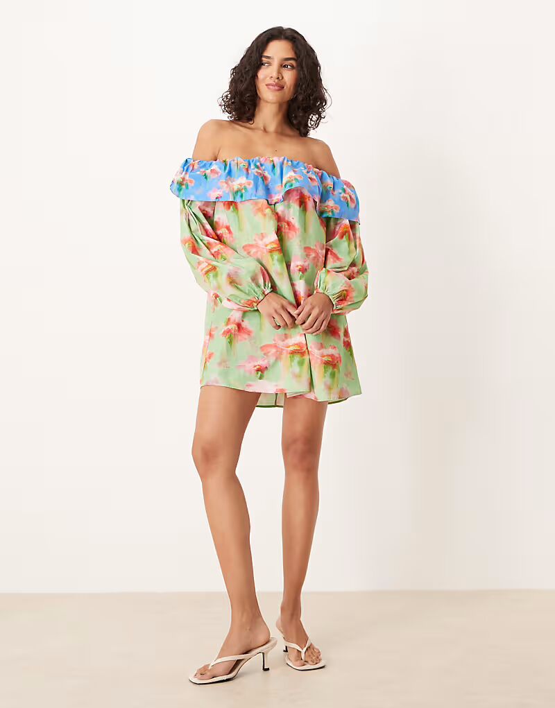 Мини-платье с оборками и открытыми плечами, с цветочным принтом Asos Design
Мини-платье с оборками и открытыми плечами, с цветочным принтом Asos Design