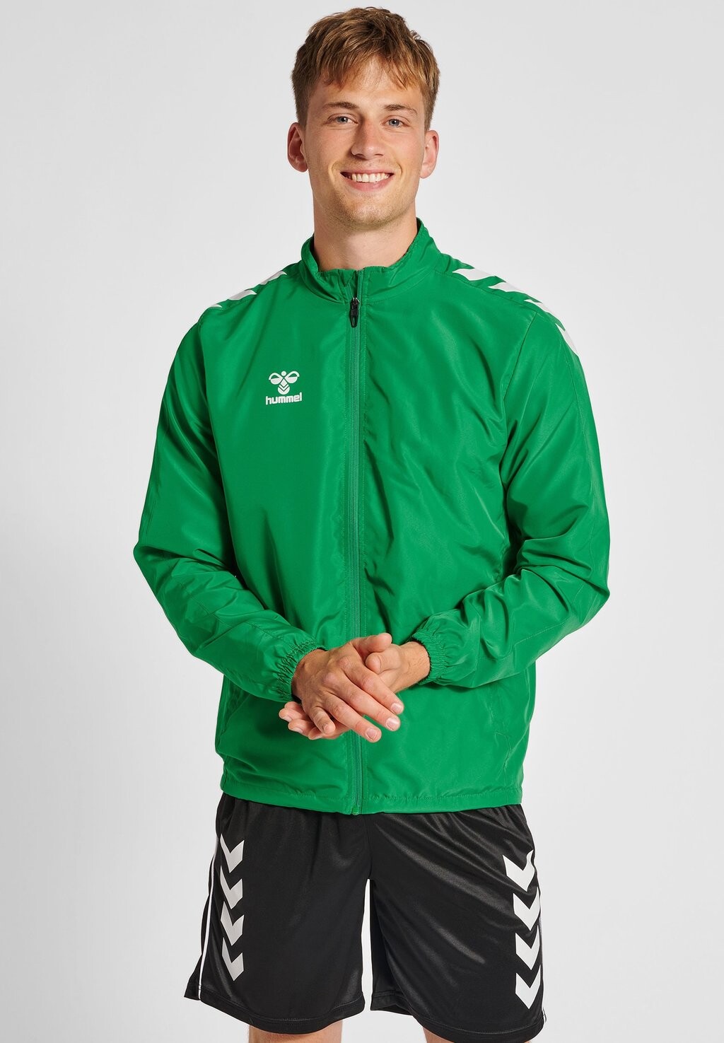 Куртка для тренировок CORE XK MICRO ZIP Hummel, цвет jelly bean 
Куртка для тренировок CORE XK MICRO ZIP Hummel, цвет jelly bean