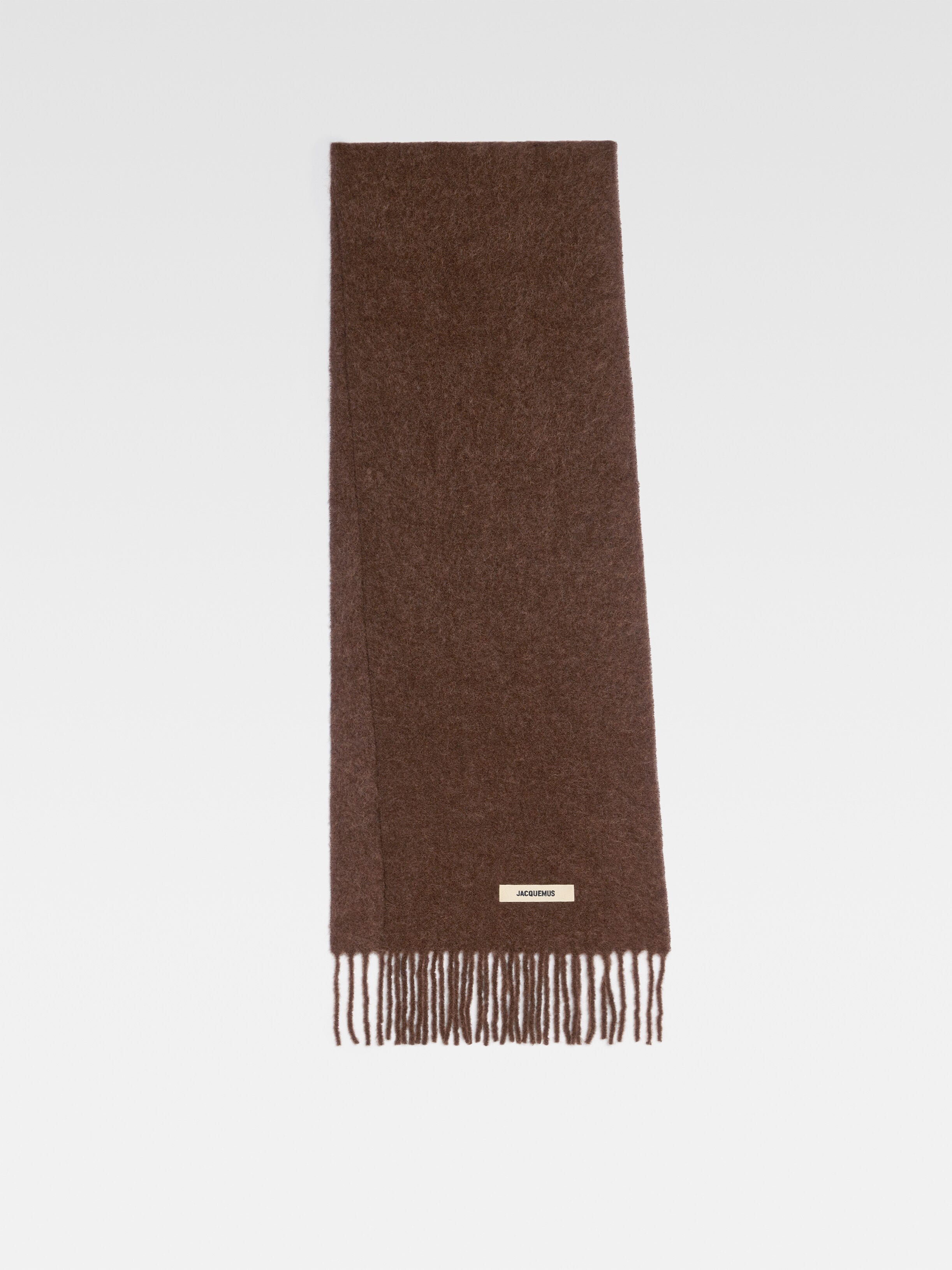 Шарф с бахромой JACQUEMUS The Carro scarf, коричневый 
Шарф с бахромой JACQUEMUS The Carro scarf, коричневый