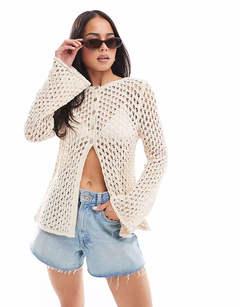 Кардиган с разрезом по горловине ASOS DESIGN, связанный крючком, цвет слоновой кости
Кардиган с разрезом по горловине ASOS DESIGN, связанный крючком, цвет слоновой кости