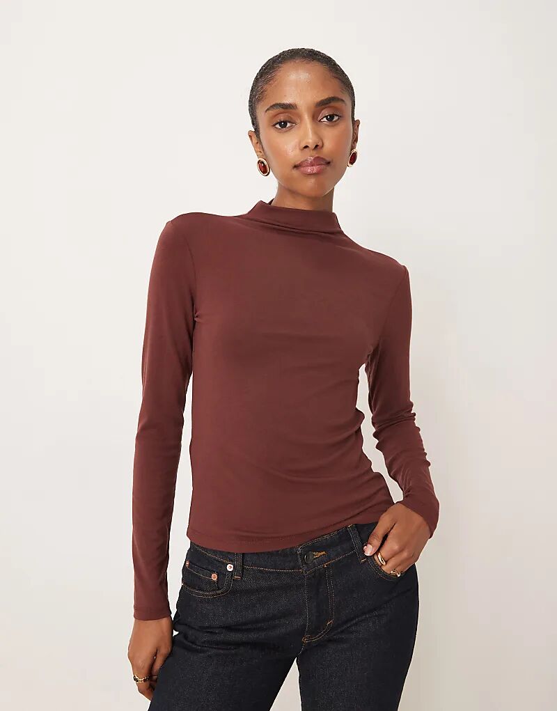 Лонгслив Mango с высоким воротом и длинными рукавами бордового цвета
Лонгслив Mango с высоким воротом и длинными рукавами бордового цвета