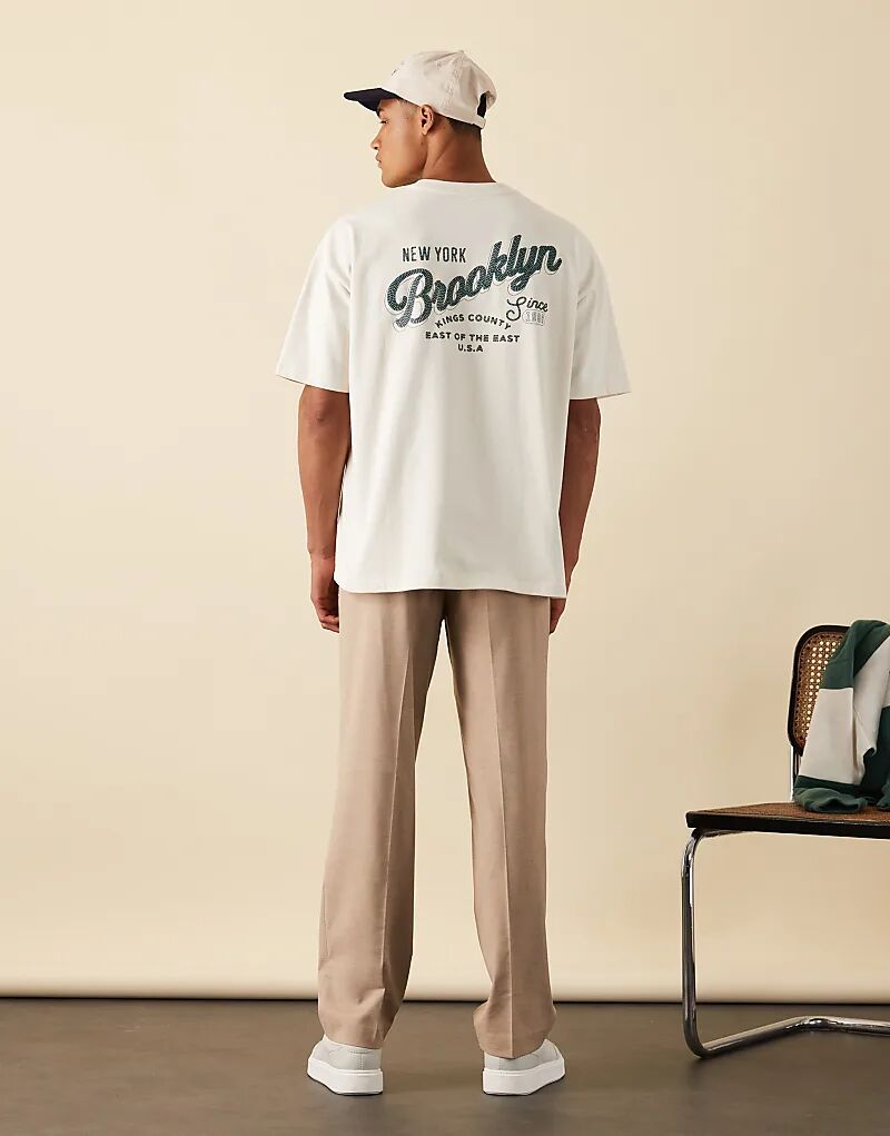 Футболка свободного кроя ASOS DESIGN с принтом города в бежево-белом цвете
Футболка свободного кроя ASOS DESIGN с принтом города в бежево-белом цвете