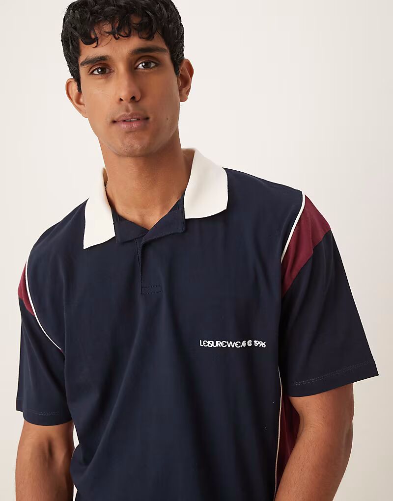 Свободное поло свободного кроя с принтом на груди ASOS DESIGN темно-синего цвета
Свободное поло свободного кроя с принтом на груди ASOS DESIGN темно-синего цвета