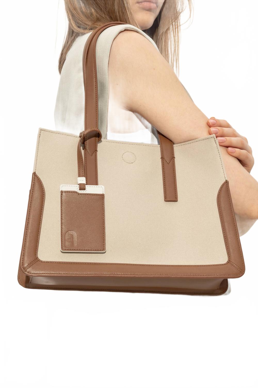 Женская сумка-тоут Baia в цвете тонированный коньяк Furla, Toni Cognac
Женская сумка-тоут Baia в цвете тонированный коньяк Furla, Toni Cognac