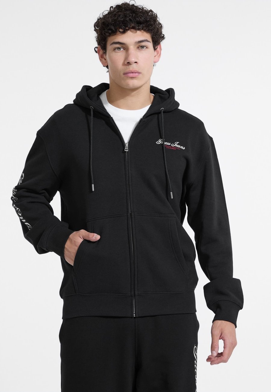 Толстовка Guess Jeans MIT REISSVERSCHLUSS, Schwarz/Black
Толстовка Guess Jeans MIT REISSVERSCHLUSS, Schwarz/Black