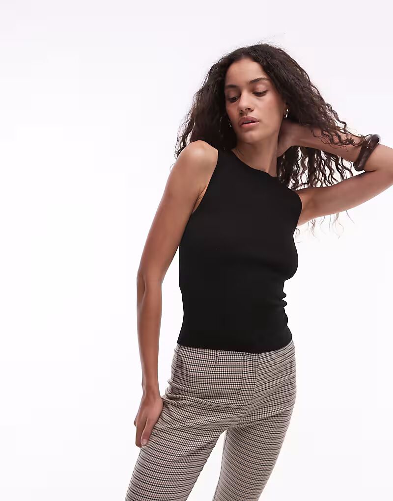 Mango - Майка с круглым вырезом в рубчик черного цвета
Mango - Майка с круглым вырезом в рубчик черного цвета