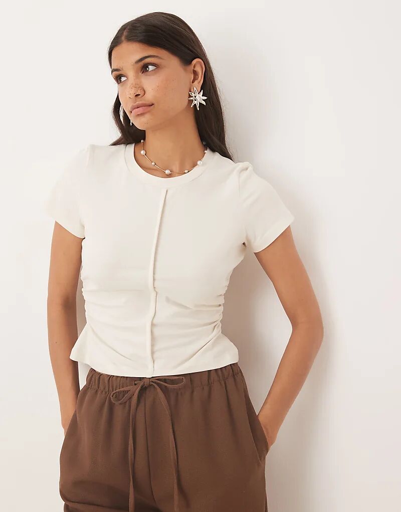 Футболка из чесаного хлопка с усадкой и вставкой на талии кремового цвета от ASOS DESIGN
Футболка из чесаного хлопка с усадкой и вставкой на талии кремового цвета от ASOS DESIGN