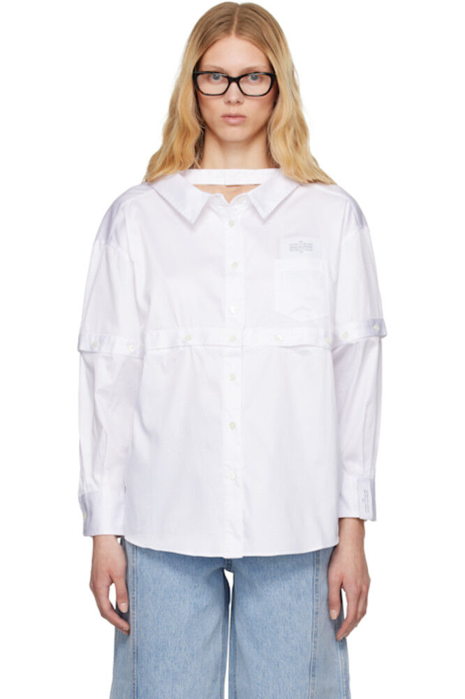 Белая рубашка с несколькими пуговицами и рваными краями Rokh
Белая рубашка с несколькими пуговицами и рваными краями Rokh