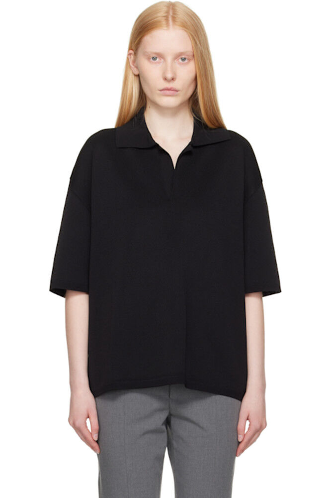 Черная футболка-поло с коротким рукавом AMI Paris
Черная футболка-поло с коротким рукавом AMI Paris