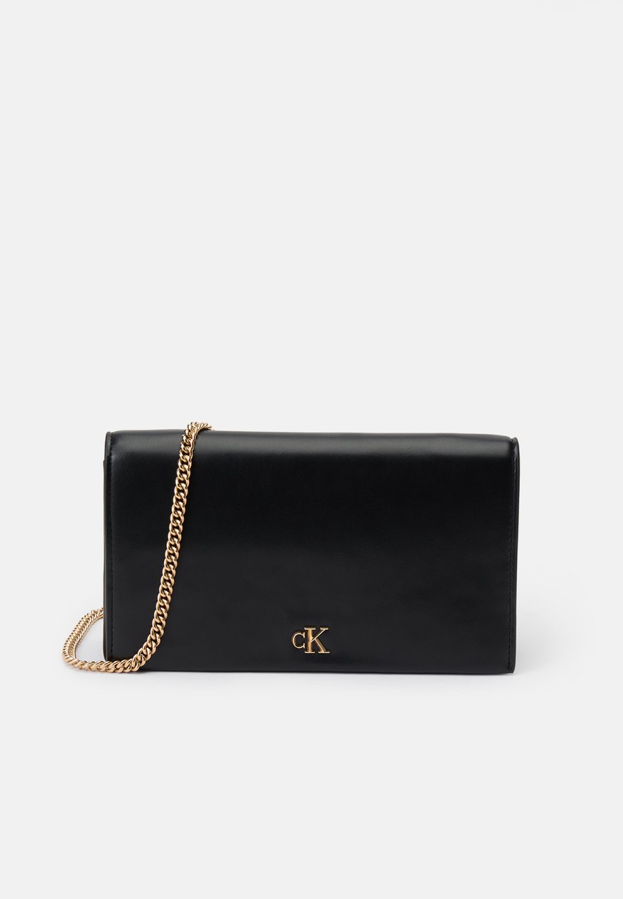 Кошелек Calvin Klein WALLET ON CHAIN, Black
Кошелек Calvin Klein WALLET ON CHAIN, Black
