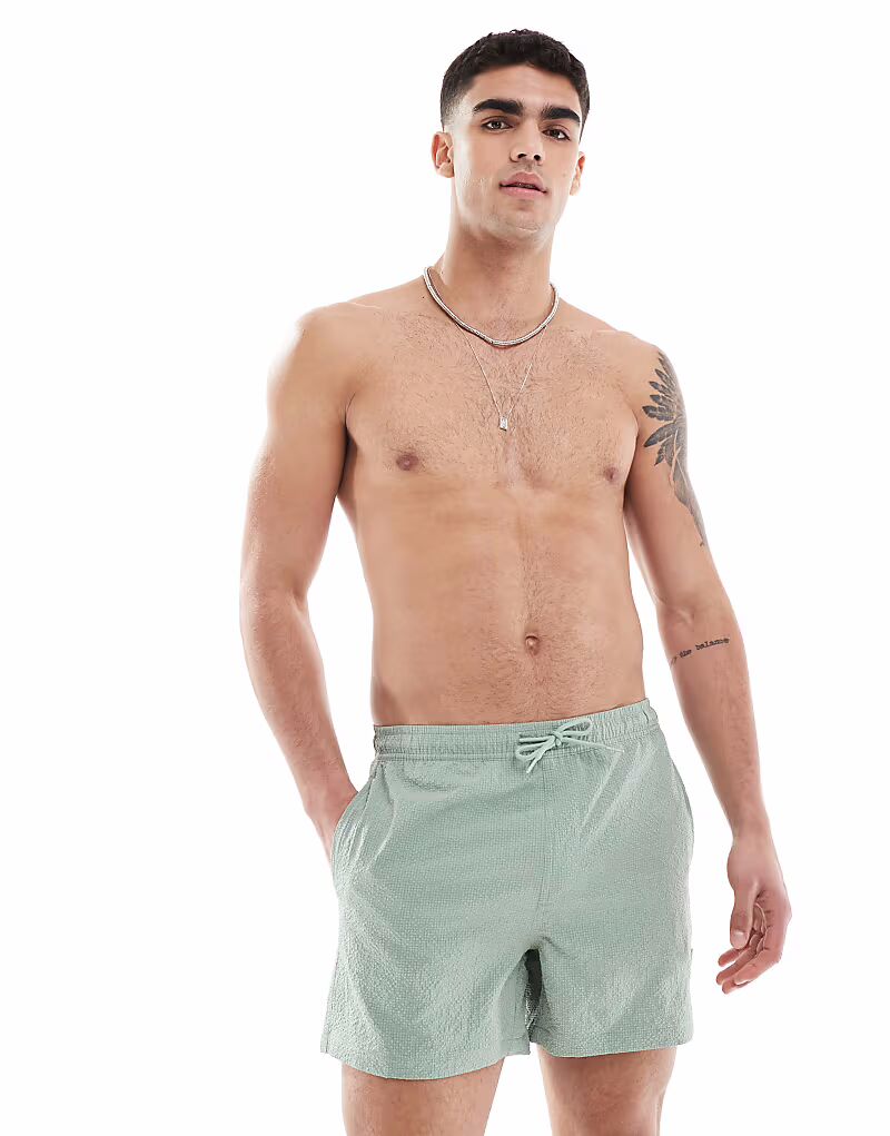 Плавки-шорты ONLY & SONS из ткани сирсакер светло-зеленого цвета
Плавки-шорты ONLY & SONS из ткани сирсакер светло-зеленого цвета