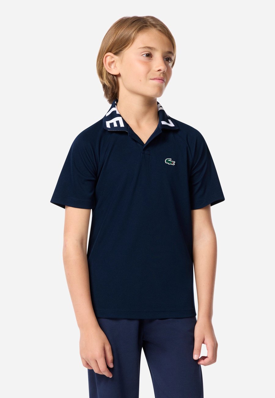 Поло Lacoste SPORT RAGLAN UNISEX, Marine/Dark Blue
Поло Lacoste SPORT RAGLAN UNISEX, Marine/Dark Blue